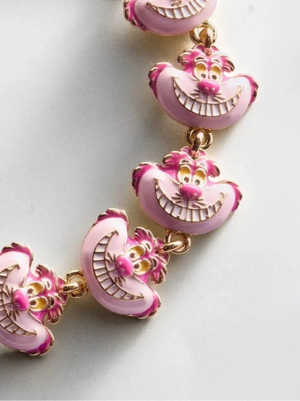 Baublebar NWT Alice In Wonderland Cheshire Cat Repeating Faces Braces